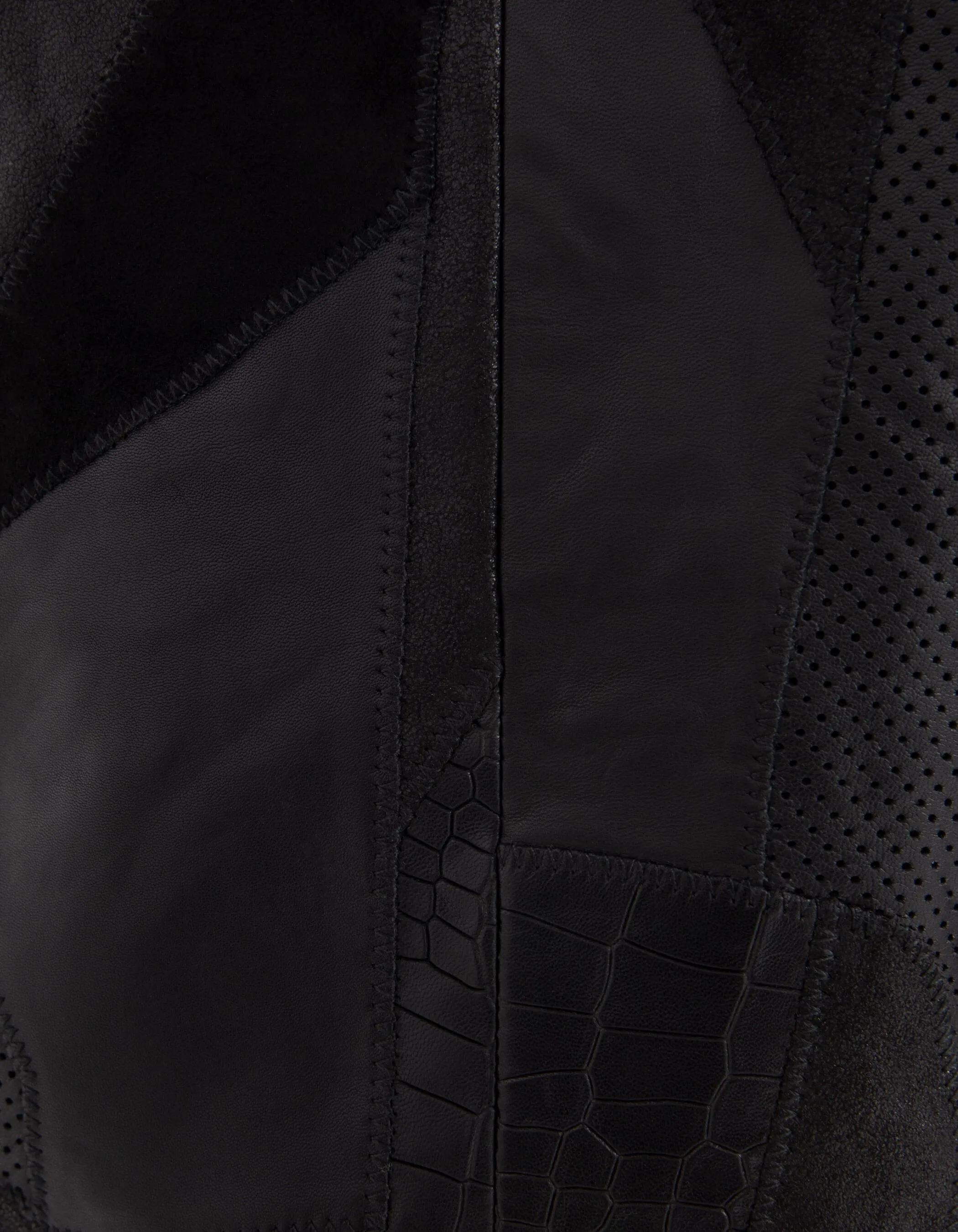 Black biker-style leather jacket with patchwork effect for women.
