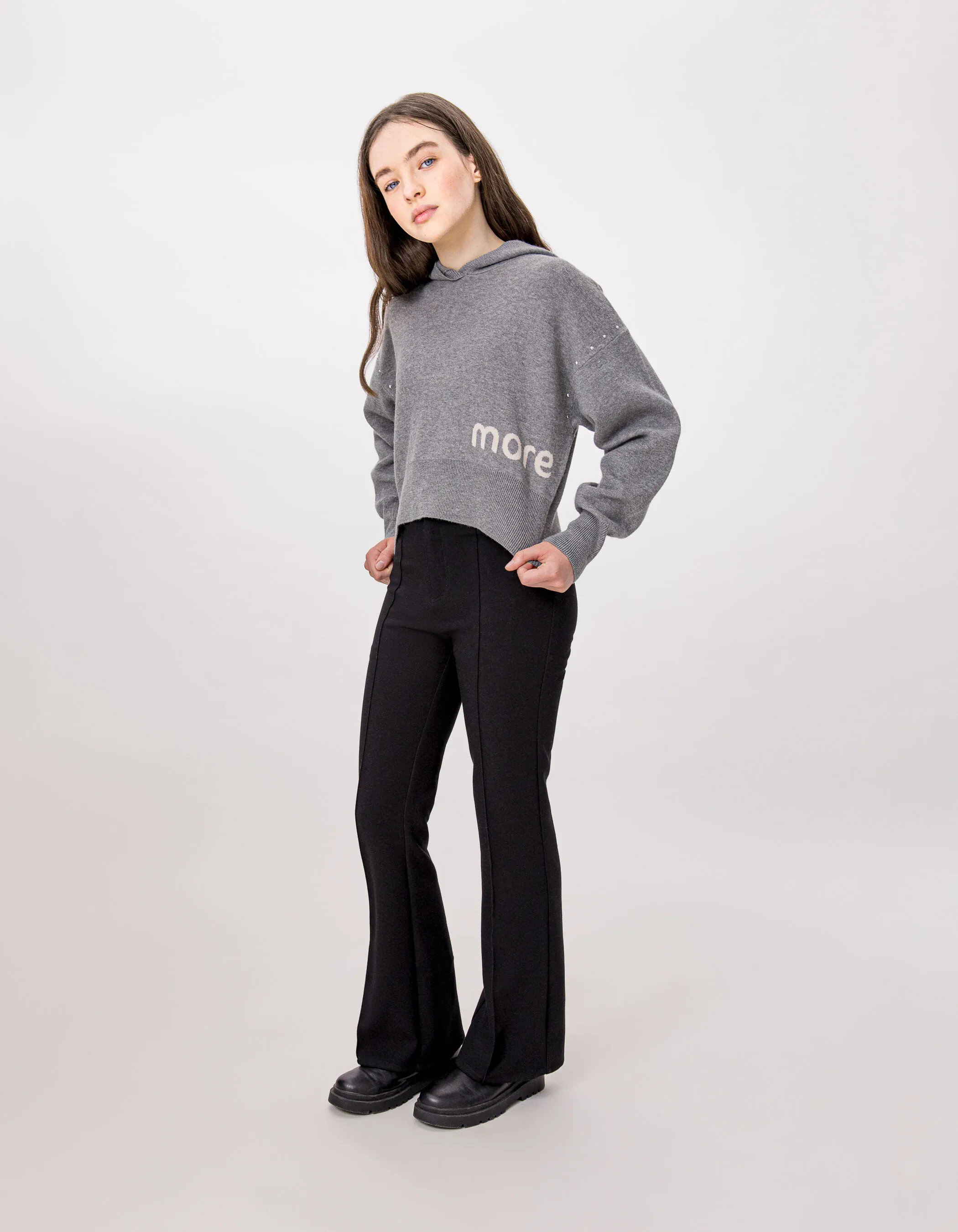 Black flare pants with pleats-creases for girls.